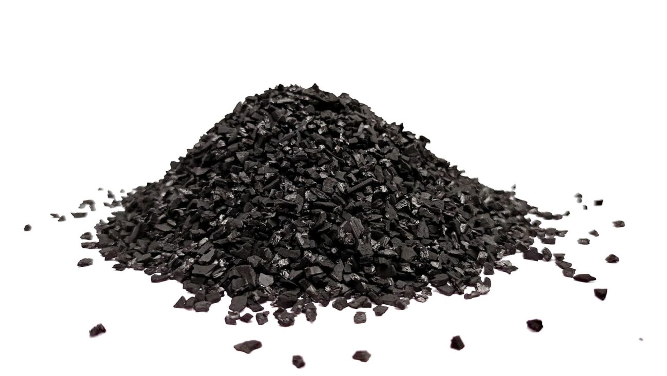 A pile of black coal on a white background