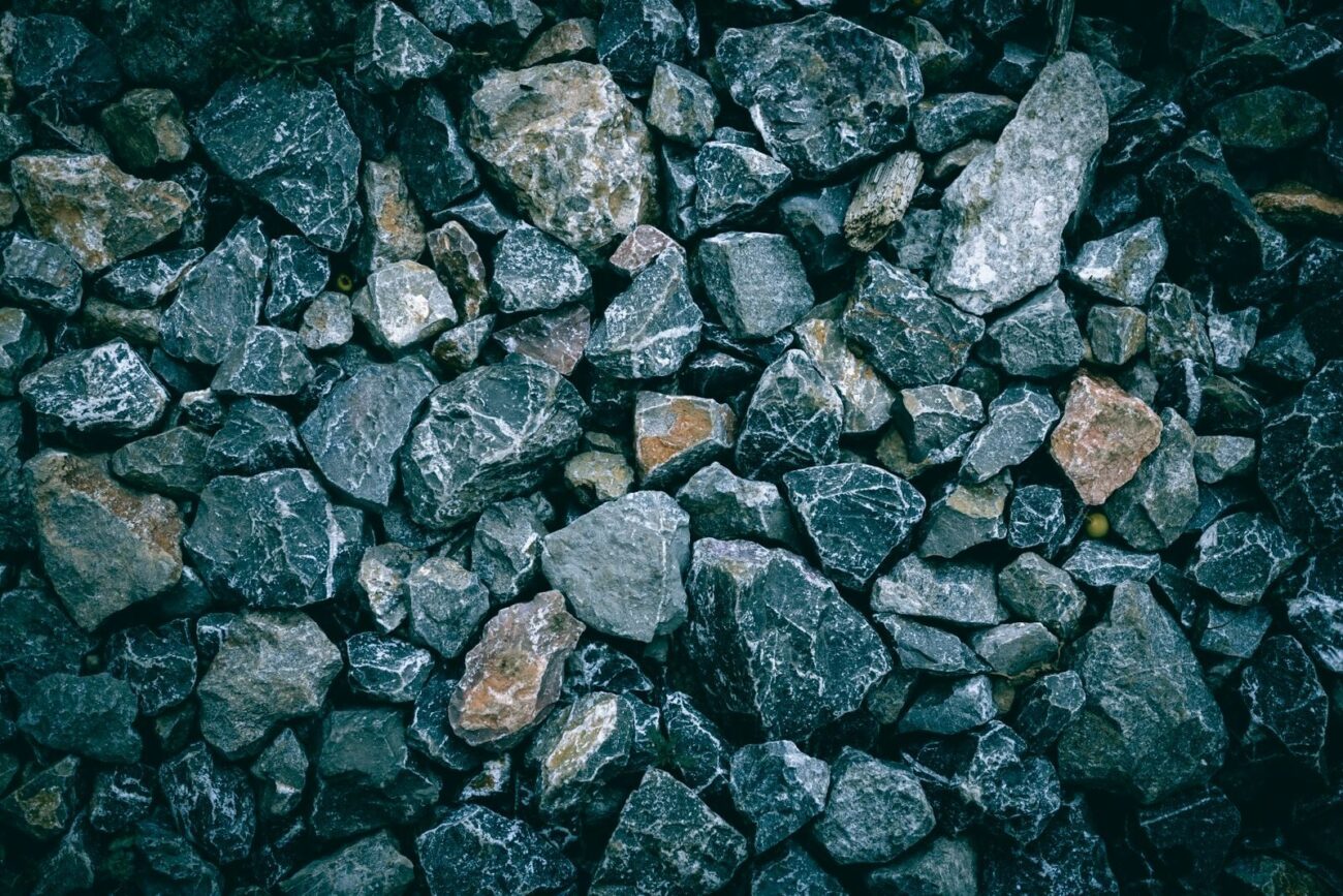 Dark crushed basalt-type rock in broken pieces